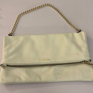 Dimoni peopled ivory  leather unique fold over bag from Spain. New no tags.